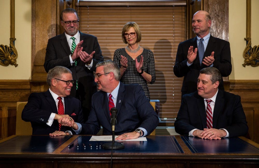 Gov. Holcomb signs Sunday alcohol sales bill