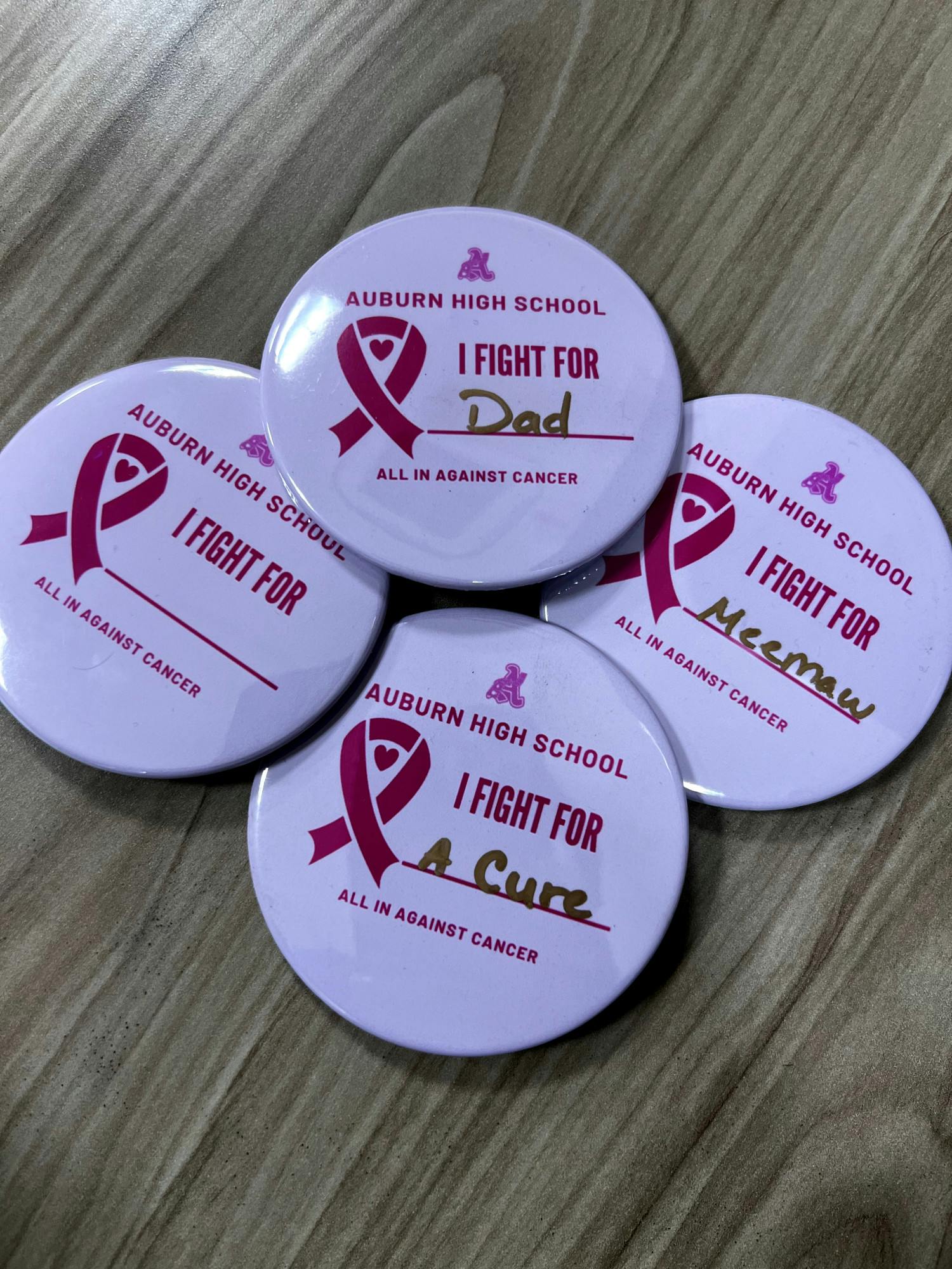 pink out buttons 