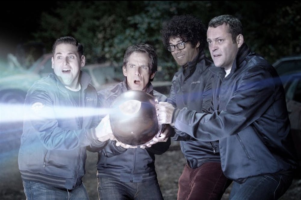 Franklin (Jonah Hill), Evan (Ben Stiller), Jamarcus (Richard Ayoade) and Bob (Vince Vaughn) playfully tamper with a piece of alien technology.