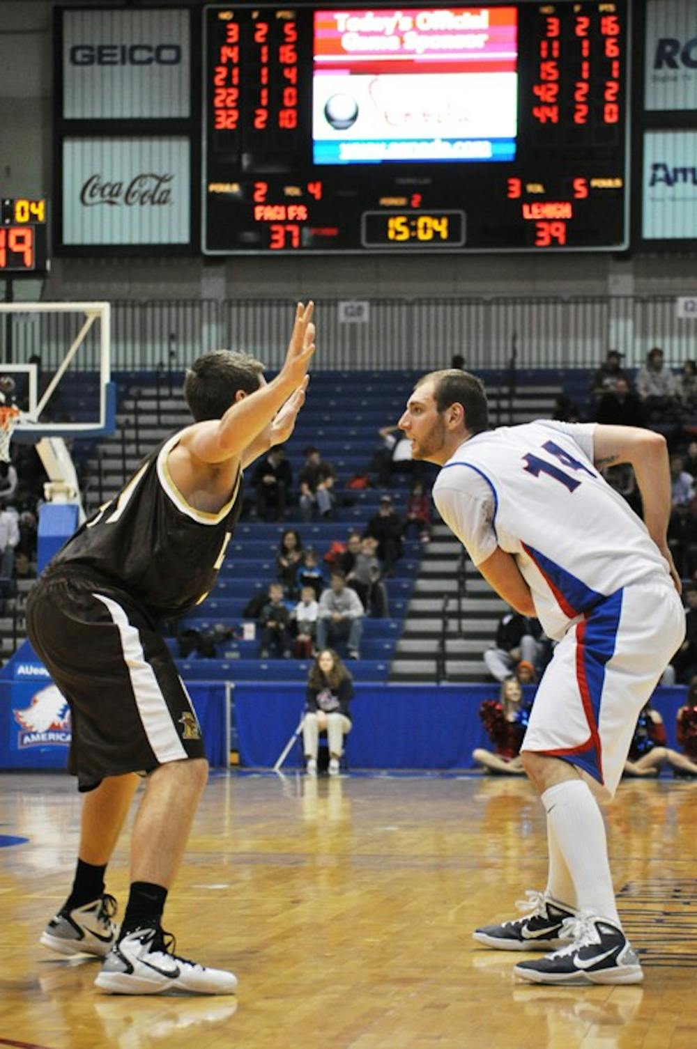 SIZING UP â€” Senior forward Vlad Moldoveanu looks for an open pass against a Lehigh opponent. Moldoveanu scored a career-high 39 points in the Eagles\' 82-75 victory on Saturday in Bender Arena. 