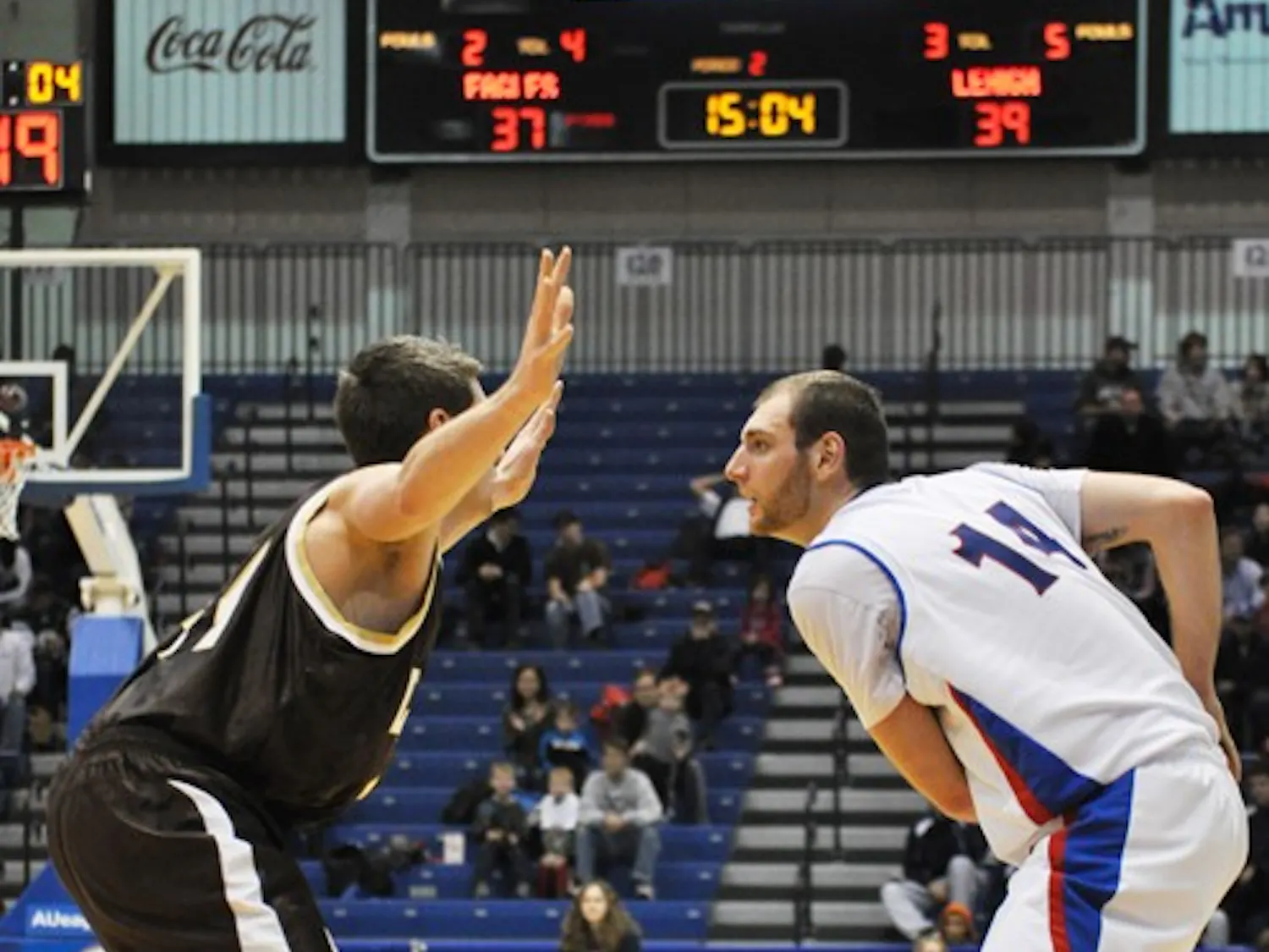 SIZING UP — Senior forward Vlad Moldoveanu looks for an open pass against a Lehigh opponent. Moldoveanu scored a career-high 39 points in the Eagles\' 82-75 victory on Saturday in Bender Arena.