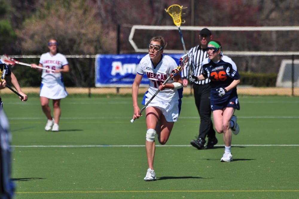 Racing to the goal â€” Sophomore midfielder Emily Burton tries outrunning an opponent in a game earlier this season. Burton contributed a goal during the Eaglesâ€™ 13-6 loss to Lehigh University. The Eagles will next play George Mason on April 5th. 