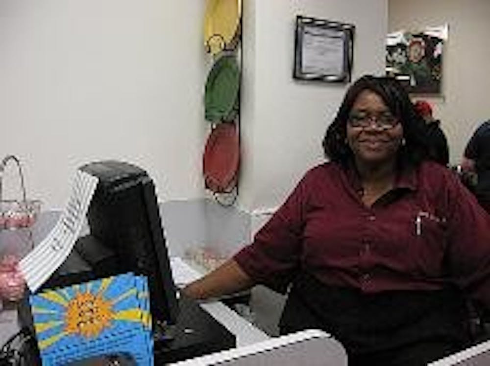 TDR'S FIRST LADY - Christine Hamlett-Williams, known to students as Ms. Christine, has been working for AU since 1981. She swipes students into TDR Mondays through Fridays from 7 a.m. to 3:30 p.m. and said she loves her job because it allows her to intera