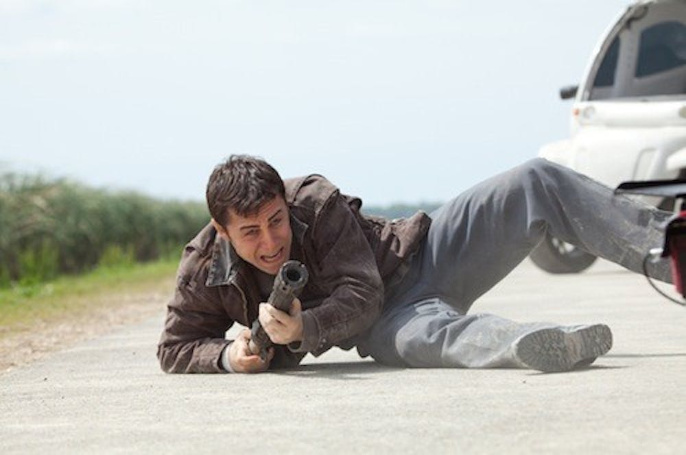 Joseph Gordon-Levitt as "Joe" in TriStar Pictures, Film District, and End Game Entertainment's action thriller LOOPER.￼