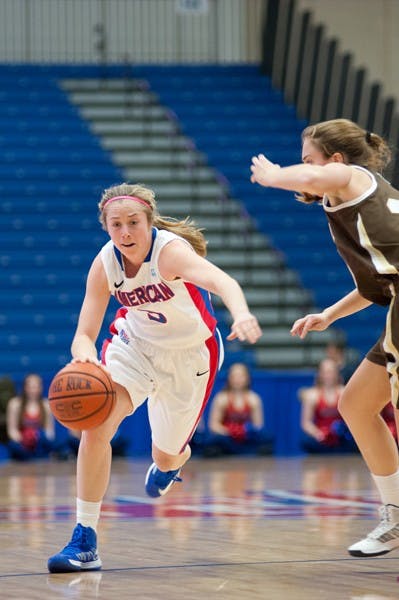 Jen Dumiak dribbles by a Lehigh defender as The Eagles lost to the Mountain Hawks 71-55 in Bender Arena Feb. 13. 