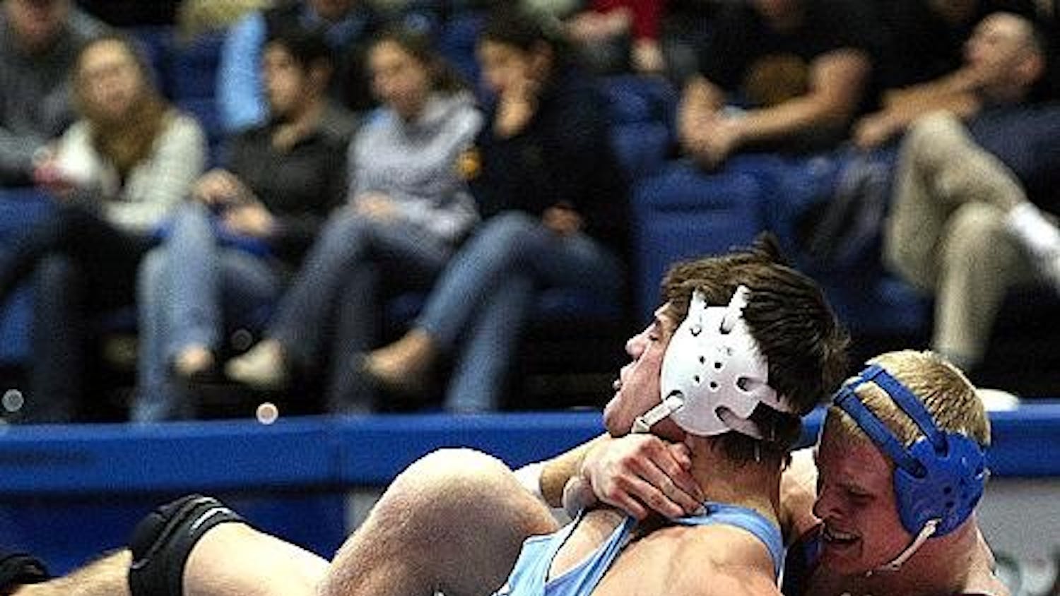 TAKE DOWN - No. 3 nationally ranked Mike Cannon, takes down his Columbia University opponent in the Eagles' Jan. 25 wrestling match. The Eagles won, and Cannon improved to 20-0 in the 174-pound weight class this season.