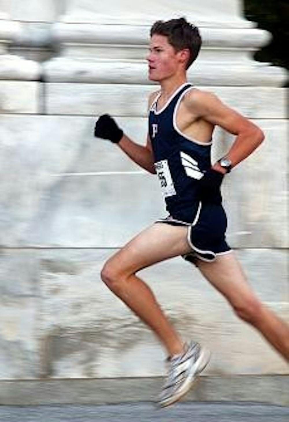 John Ross, a local high school student, won the race at 14:58.