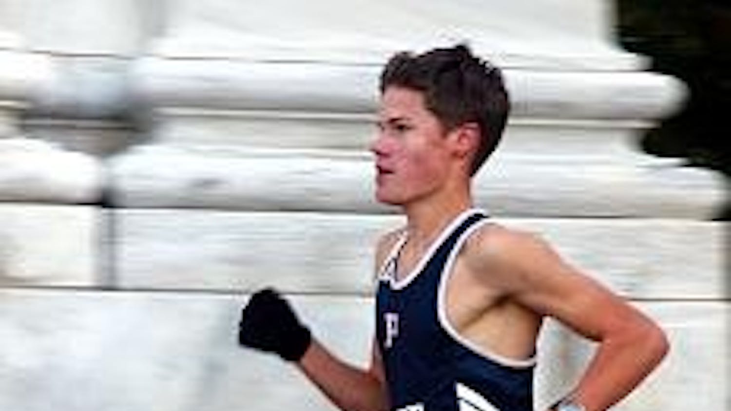 John Ross, a local high school student, won the race at 14:58.