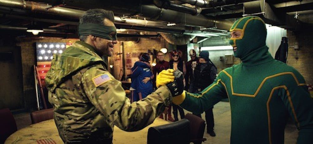 (L to R, foreground) Colonel Stars and Stripes (JIM CARREY) makes a plan with Kick-Ass (AARON TAYLOR-JOHNSON) in the follow-up to 2010?s irreverent global hit: ?Kick-Ass 2?.  