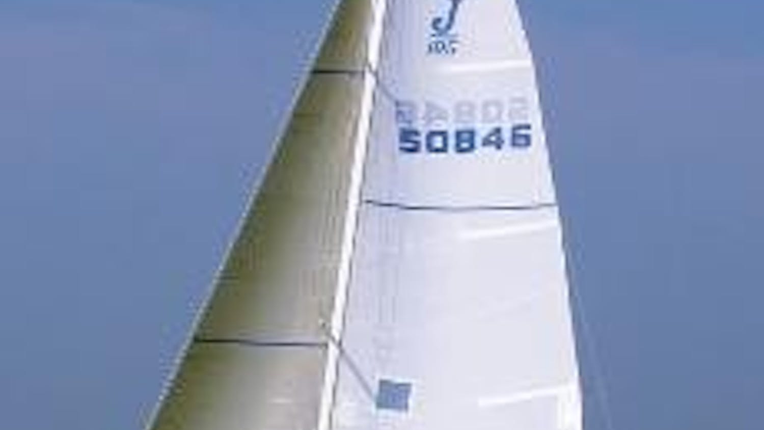 SAILING UP WIND - Adam Dexter trims the jib, Ben Burdett trims the main sail and Aaron Zankel drives the boat to third place. The sailing team worked together in five J105 races and finished with 20 total points.