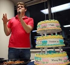 MORE WEDDINGS, MORE CAKE - John Marzabadi, a junior in the School of Public Affairs and the Queers and Allies president, serves cake at the reception after the Freedom to Marry Day event on the quad. The newlyweds included heterosexual and gay couples.