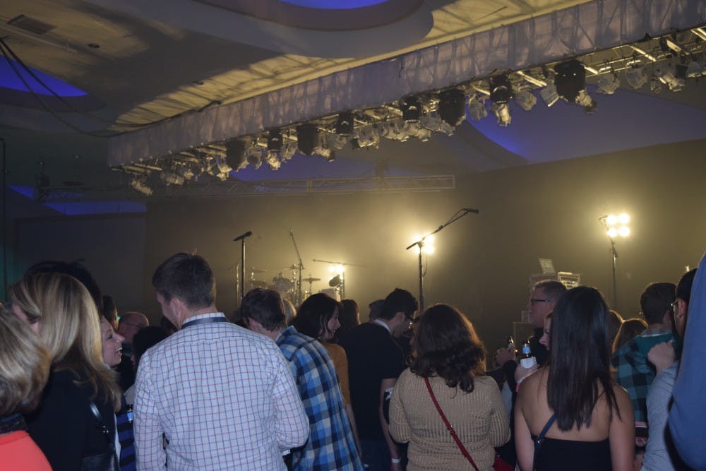 Fans and guests gather near the stage for the Neon Trees concert at the Washington Hilton's @PLAY event.&nbsp;