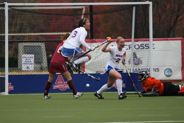 OH SO SWEET â€” Emily Stovicek and Rachel Carney celebrate their 2-1 win over Loch Haven University. The victory gives AU its set straight bid to the NCAA Tournament round of 16. They will face the University of Maryland on Saturday in College Park. AU fell to UMD 3-0 during the regular season.