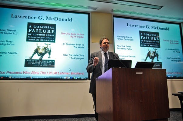 BROTHERS GRIM â€” Larry McDonald, who worked for the ill-fated Lehman Brothers investment bank, speaks at a KPU event about the companyâ€™s bankruptcy filing in September 2008. McDonald blamed the Board of Directors for the companyâ€™s inability to withstand the economic crisis and their subsequent downfall.