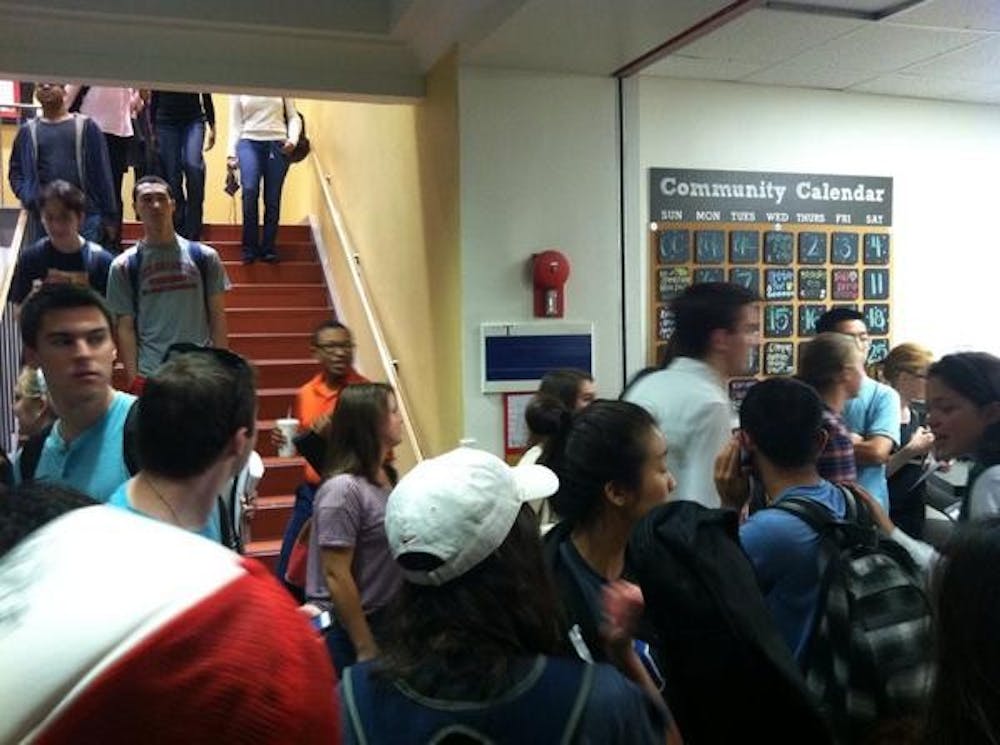 Students gather in MGC basement during tornado warning. 