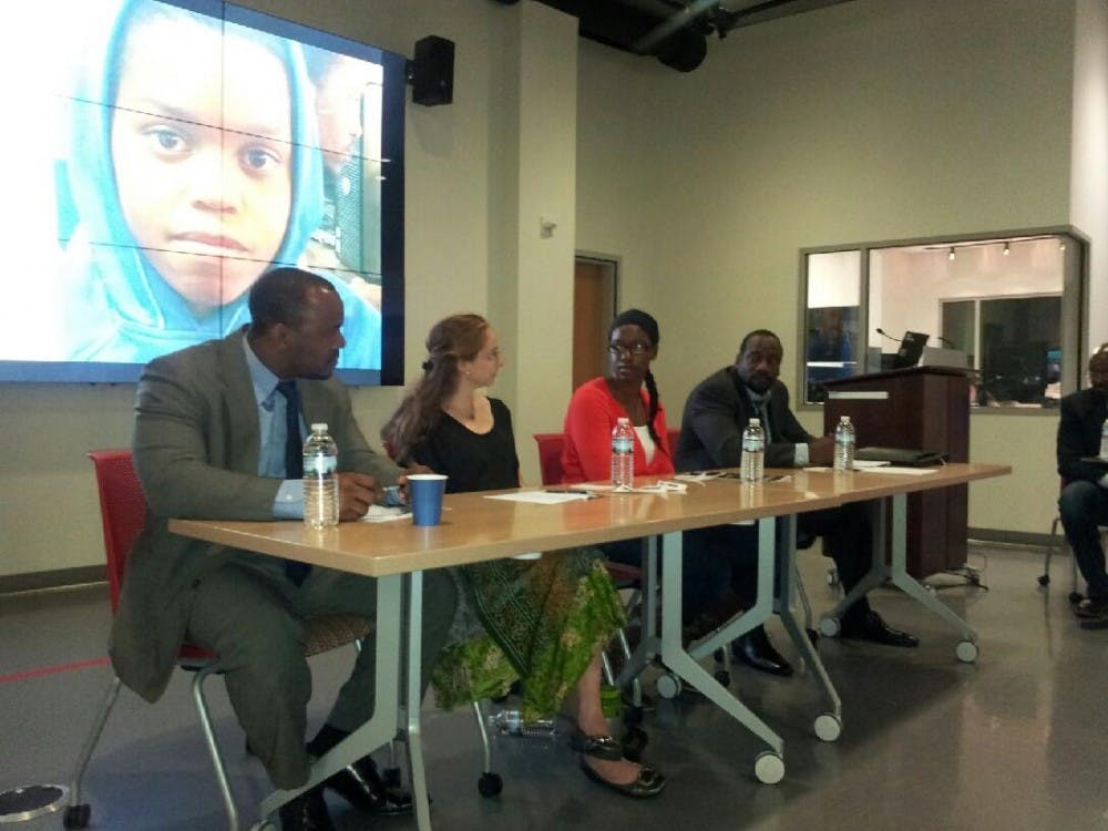 Photo Credit: Renee CuthbertPanelists discuss sports and high school academic success in the Media Innovation Lab on Tuesday.&nbsp;