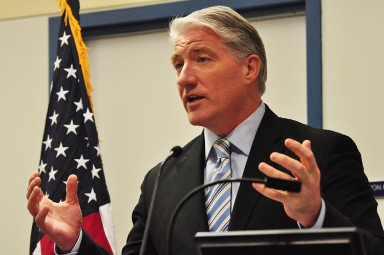 John King speaks to a packed crowd in Ward 2.