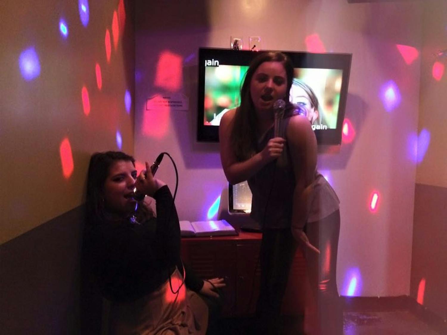 CAS senior Halle Edinboro, right, and me, proving our worth in a Muzette private karaoke room.