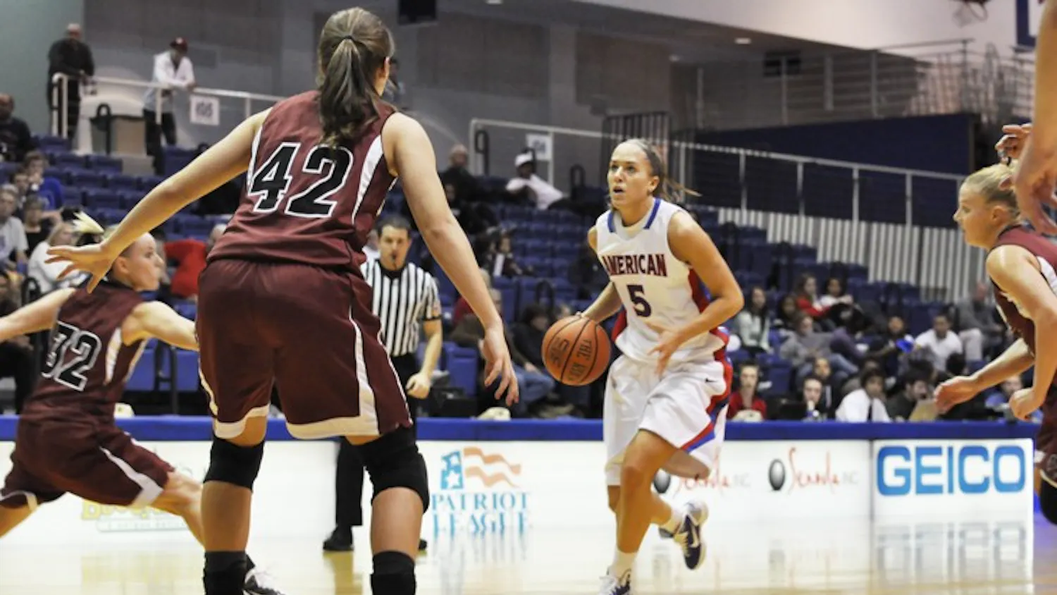 CONTROLLING THE TEMPO — Senior forward Michelle Kirk brings the ball up the court in Sunday’s 73-47 exhibition win over Indiana University of Pennsylvania at Bender Arena.
