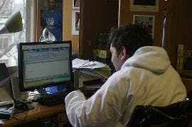 OVERCOMING OBSTACLES - Chris Miller, a freshman in the School of Public Affairs, has faced boundaries in the past because of his disabilities.  However, he chose AU because of its accessible facilities and helpful Disability Support Services. 