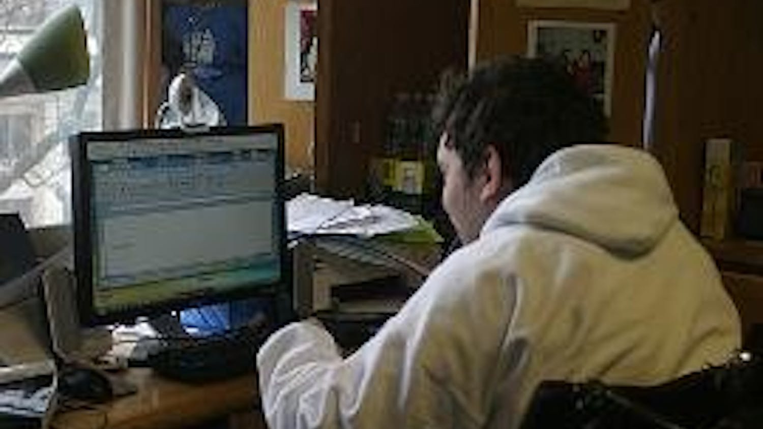 OVERCOMING OBSTACLES - Chris Miller, a freshman in the School of Public Affairs, has faced boundaries in the past because of his disabilities. However, he chose AU because of its accessible facilities and helpful Disability Support Services.