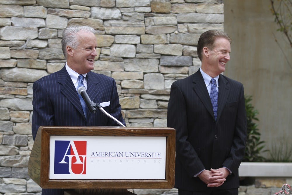 	Jack Cassell (left) speaks at the ribbon-cutting ceremony for Cassell Hall with Stafford Cassell Jr. (right) on Sept. 27.
