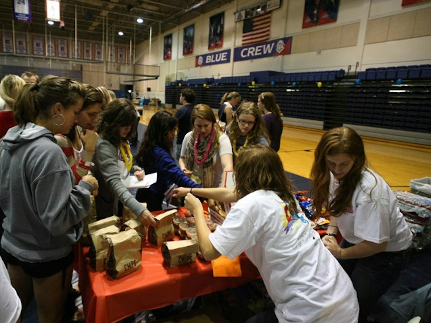 WIDE-AWAKE — Students stayed up all night in Bender Arena Tuesday to raise money for St. Jude Research Hospital. Participants ate free food, played games and contacted family members for donations. The event at AU was part of a national fundraiser for childhood cancer research.