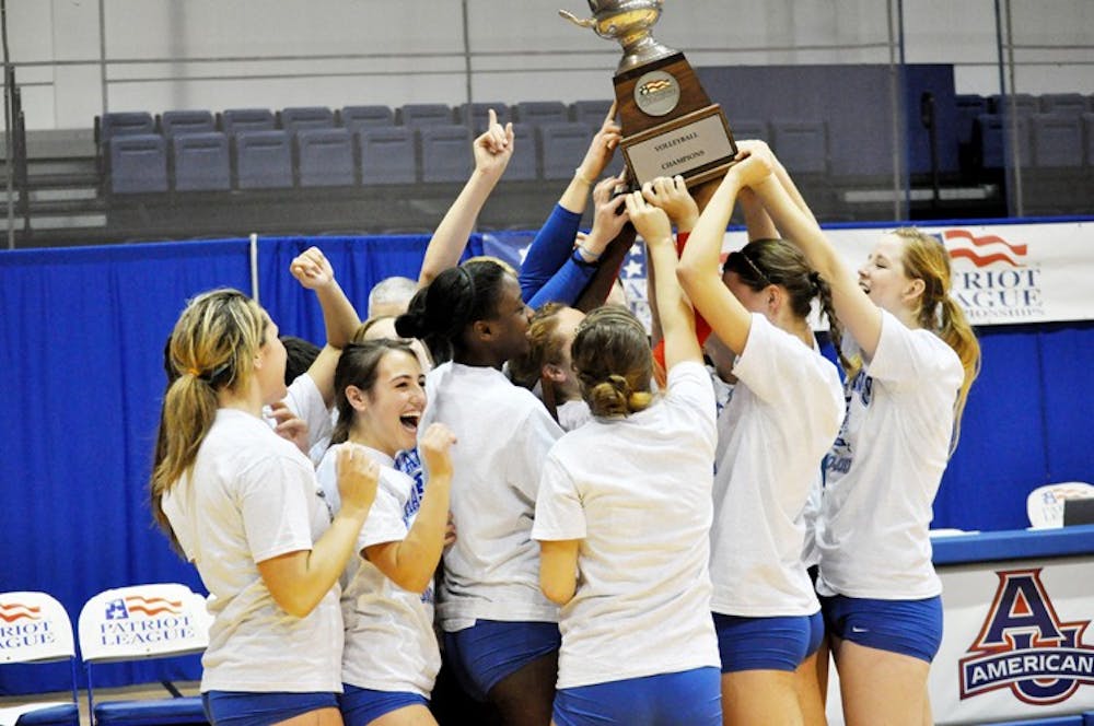 CHAMPS â€” The AU volleyball team raises the Patriot League Championship trophy after defeating Colgate University in straight sets on Sunday. The Eagles have now been crowned Patriot League Champions nine of the past 10 years.