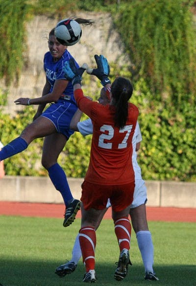 JUMPING UPâ€” Kelsey Brasher jumps up for a ball during AUâ€™s 2-0 win over conference rival Holy Cross on Friday. The win keeps AU perfect in the Patriot League with a 2-0 conference record. AU will play Colgate University on Saturday, who is in the basement of the conference. AU is 7-7 on the year.