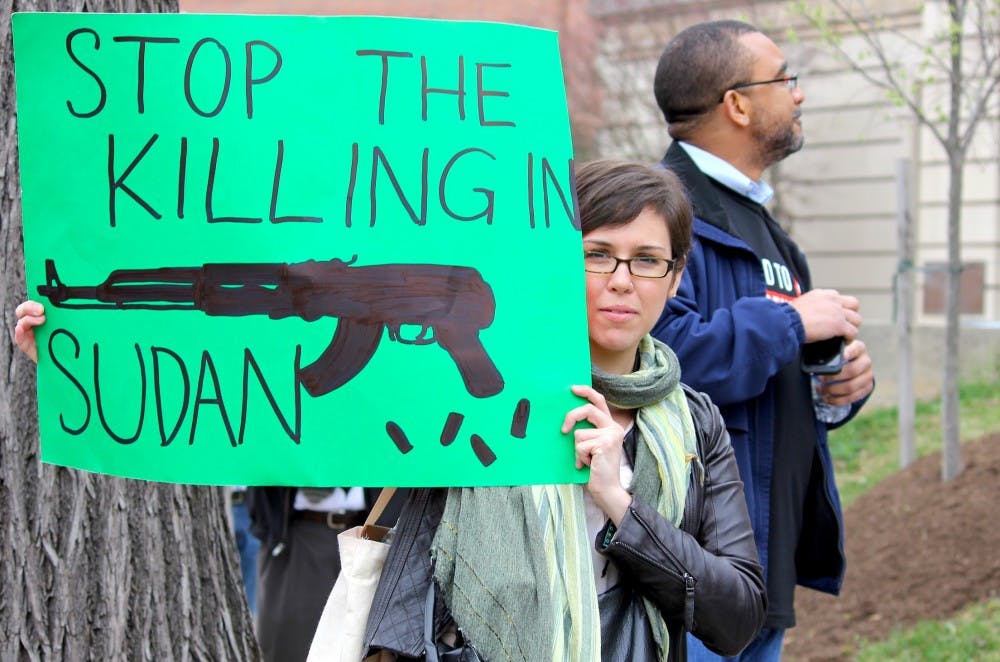 Eryn Schornick, a member of activist group United to End Genocide, protests outside the Sudanese embassy March 16.