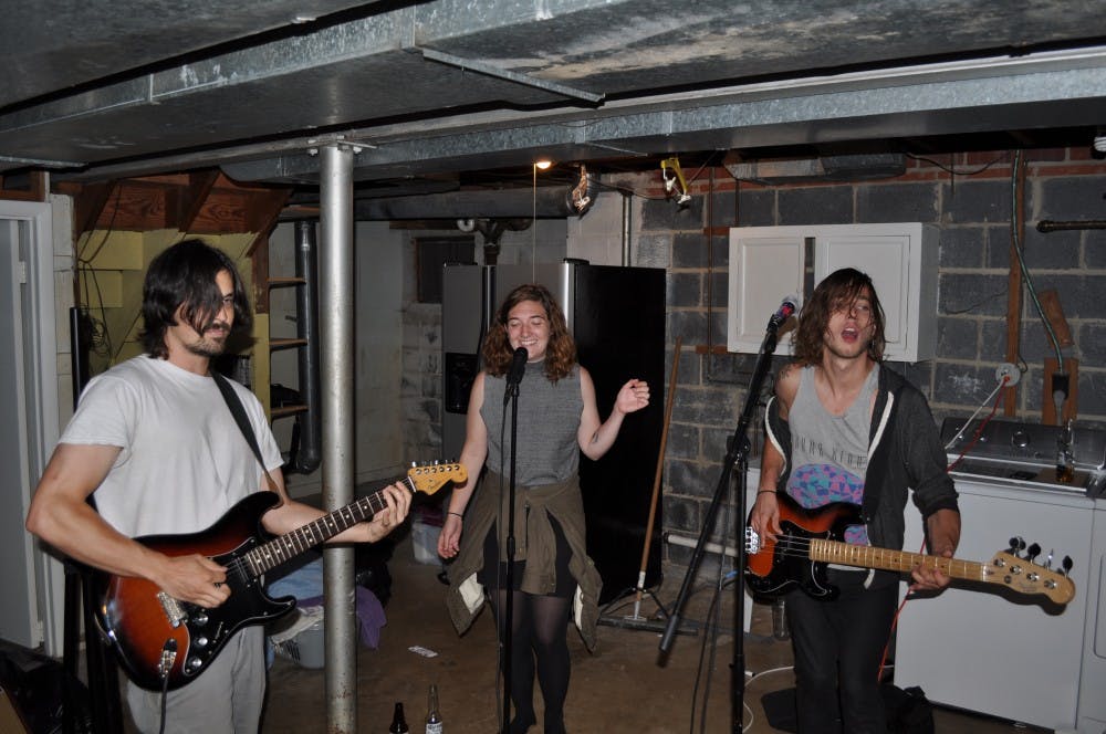 Ian Dandridge, Emma Bleker and Brendan Ra Tyler are playing one of their songs.