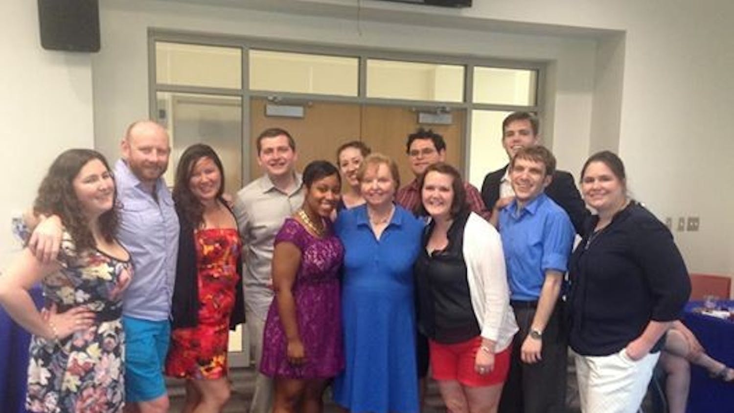 	Current Political Communication students surround former SOC professor Dotty Lynch.