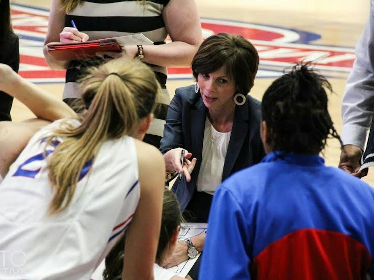 Photo Credit: Rosie Black/Photo Collective&nbsp;Head coach&nbsp;Megan Gebbia discusses game strategy&nbsp;with her team during a game last season. The Eagles will look to defend their conference title this year.&nbsp;