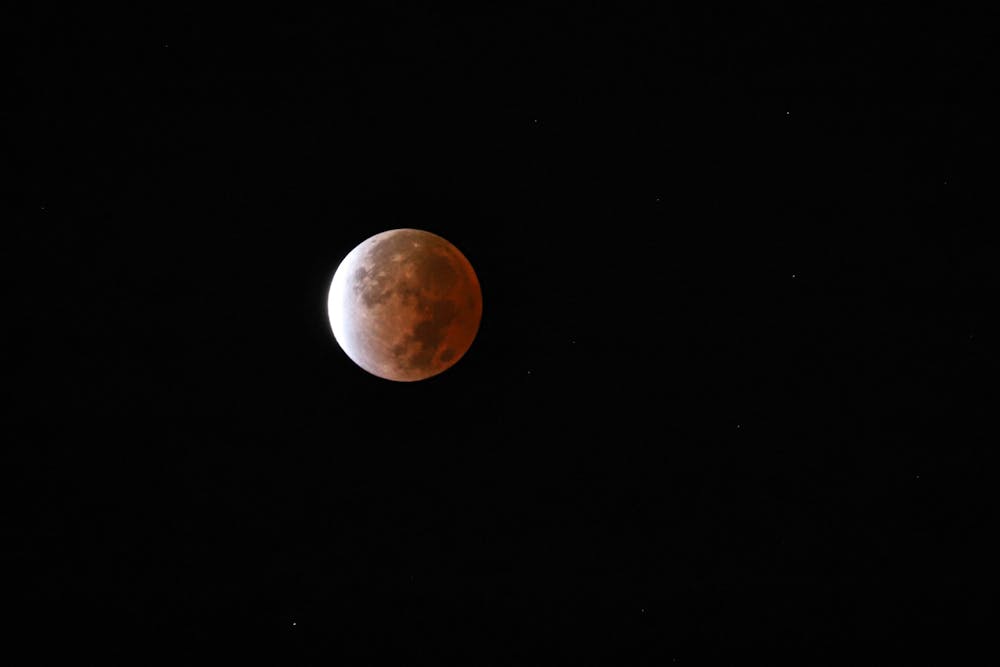 Lunar eclipse turns moon orange over DC