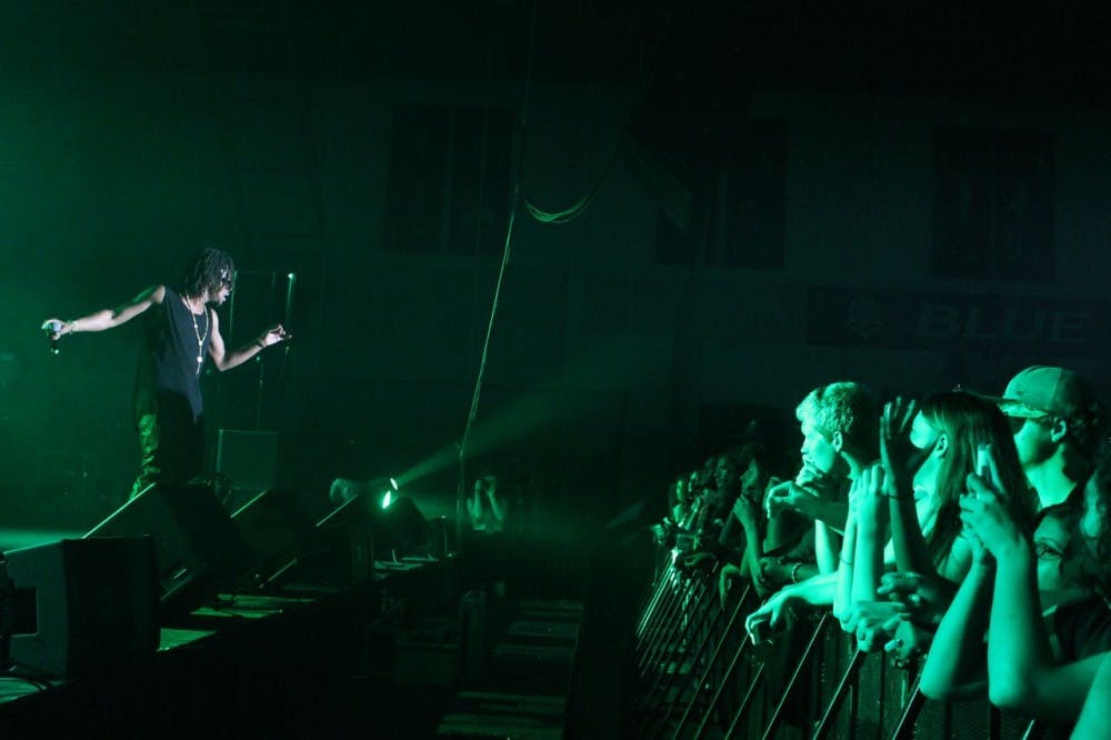 	AU students watch Lupe Fiasco perform in Bender Arena on Aug. 24.