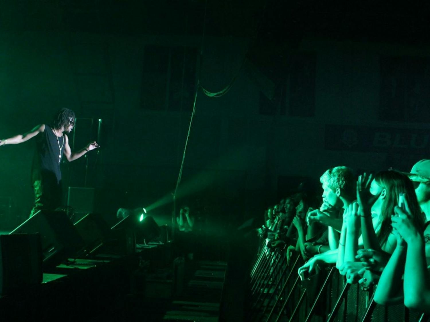 	AU students watch Lupe Fiasco perform in Bender Arena on Aug. 24.