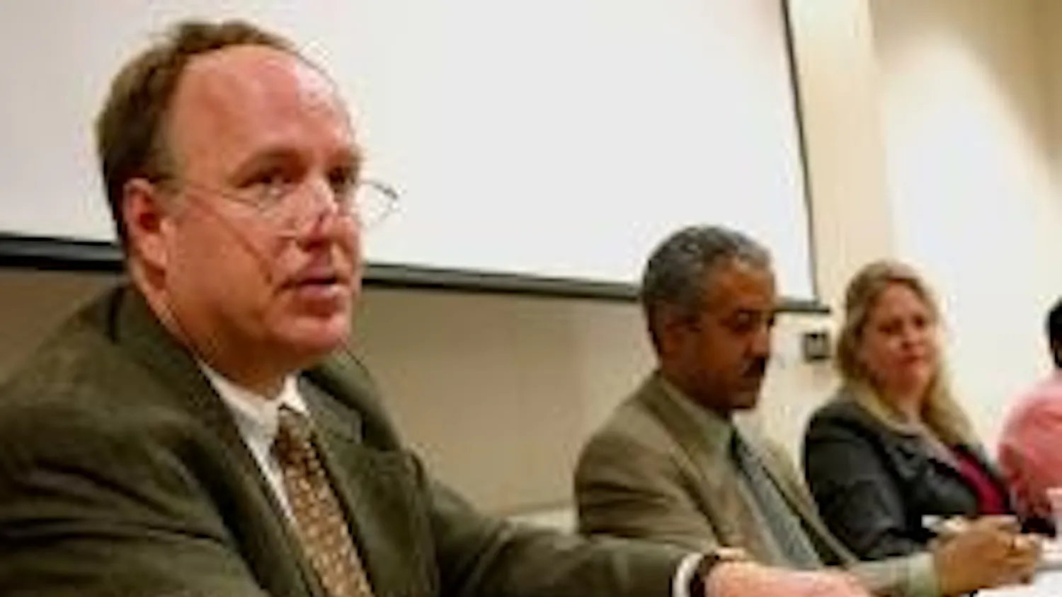 Merrill Smith discusses displaced persons' difficulities in receiving aid from their home governments.