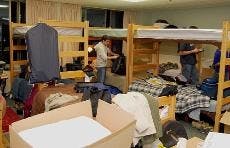 SKY LOUNGE - After Letts Terrace North flooded Saturday, the 31 residents were placed in lounges as alternative housing. The male residents are staying in the Letts Sky Lounge. The residents should be able to move back into their rooms Friday, acco