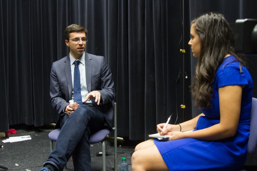 	Washington Post Columnist Ezra Klein sits down with Eagle writer Suzanne Gaber before the event. 