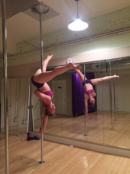 Photo Credit: Katerina Pappas&nbsp;Pole Fitness instructor&nbsp;Artemis shows off some of the moves she taught in the class.&nbsp;&nbsp;