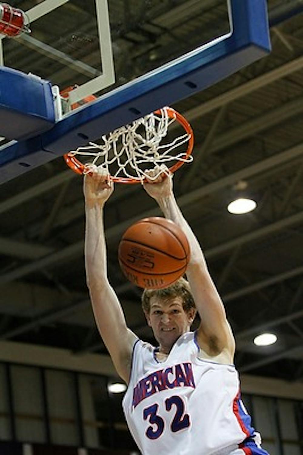 SLAM DUNK â€” Sophomore Stephen Lumpkins scores two of his 14 points in Wednesday\'s win against the Navy Midshipmen.