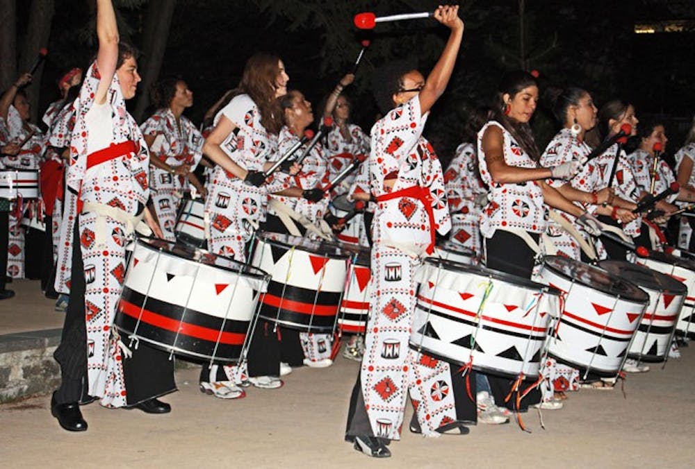 LISTEN UP â€” D.C. all-female percussion band Batala plays in the amphitheatre to kick off Take Back the Night, an annual event in which students and community members march around campus to oppose sexual violence.