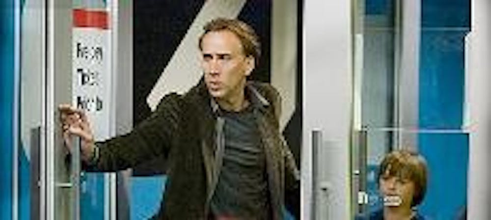 CAGED IN - Nicholas Cage (above) plays an MIT astrophysics professor who stumbles upon a time capsule that predicts future disasters in "Knowing." Though the fim starts off with a solid plot, the director's attempt to make the graphics beiievable falls sh
