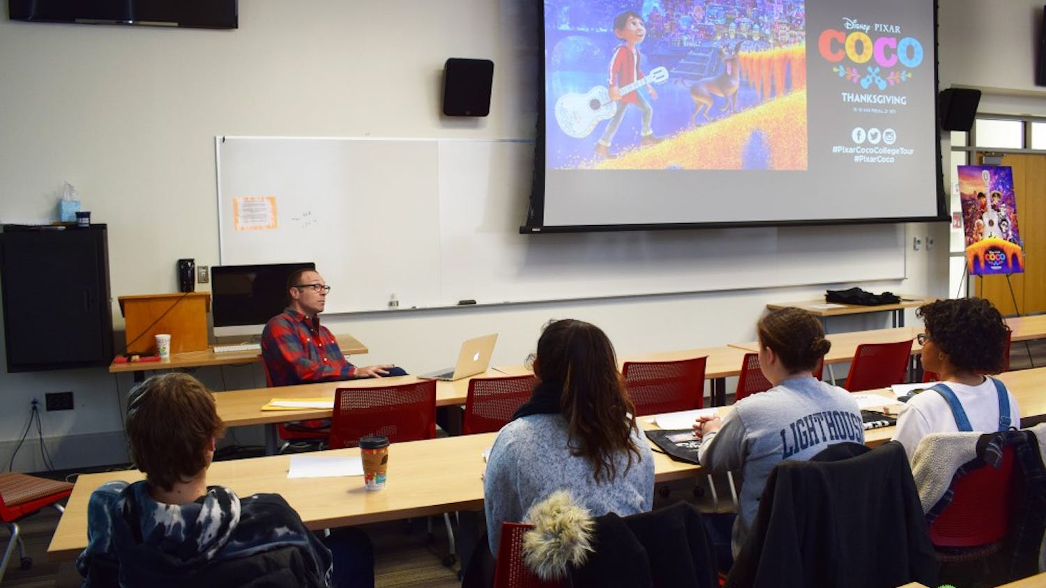 "Coco" story supervisor Jason Katz gives a presentation to students about the film in SOC on Monday, Nov. 13.