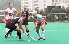 No. 23 Denise Infante and No. 5 Carly Boyce batle it out against Towson. 