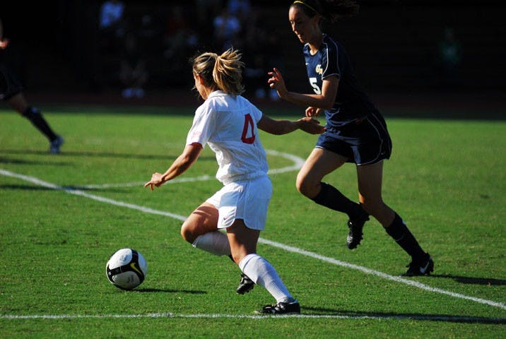 UP THE MIDDLE â€” AU junior Marissa Crollett takes the ball up the middle in a game against cross-town rival George Washington University. The Eagles dropped their final non-conference match 1-0 to the Princeton University Tigers. Princeton improved to a perfect 7-0 against AU all time.