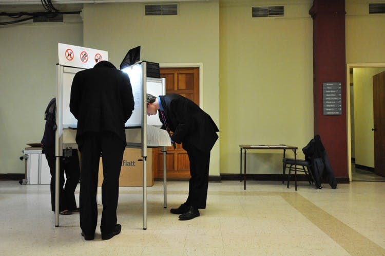 DEMOCRACY IN ACTION - ANC 3D 02 and 07 candidates Tyler Sadonis and Deon Jones cast their votes in the 2010 election. Local polling stations included the Metropolitan Memorial United Methodist Church (Precinct 9) and the Horace Mann Community Center (Precinct 10).