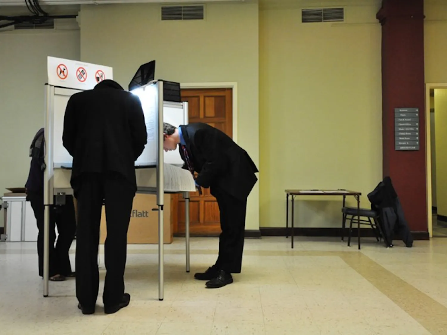 DEMOCRACY IN ACTION - ANC 3D 02 and 07 candidates Tyler Sadonis and Deon Jones cast their votes in the 2010 election. Local polling stations included the Metropolitan Memorial United Methodist Church (Precinct 9) and the Horace Mann Community Center (Precinct 10).