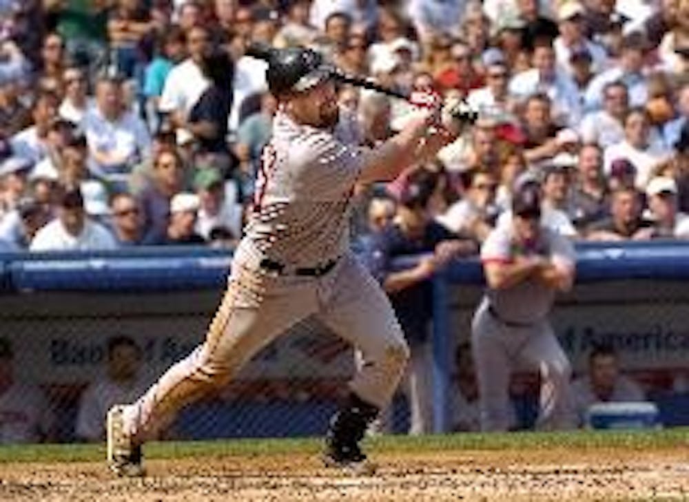 STILL SWINGING - All-Star Kevin Youkilis needs to keep his strong season going if the Red Sox are to make it back to the playoffs this season.  The team is 3.5 games behind the Rays in the AL East as of August 26th.