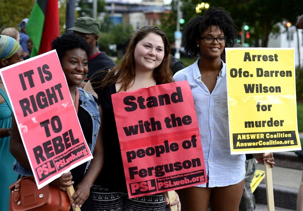 	Activists demonstrate in Washington, DC, in support of Michael Brown and Ferguson on Sept. 6. 